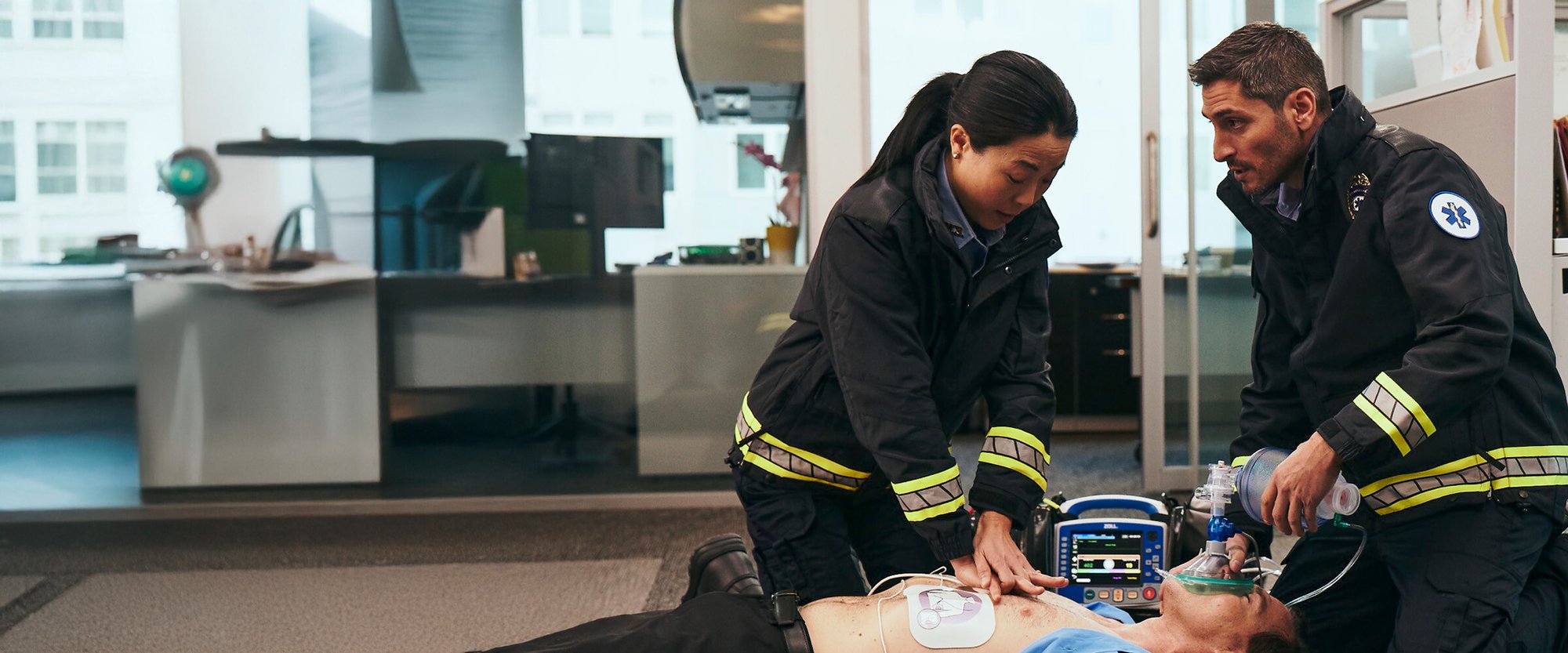 first responders treating a patient