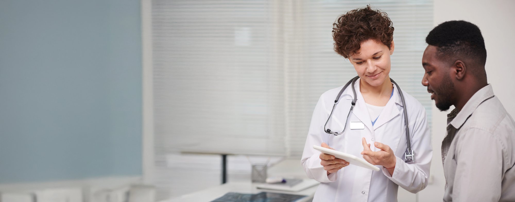 Cardiologist shares information with a LifeVest wearable defibrillator patient via a tablet device