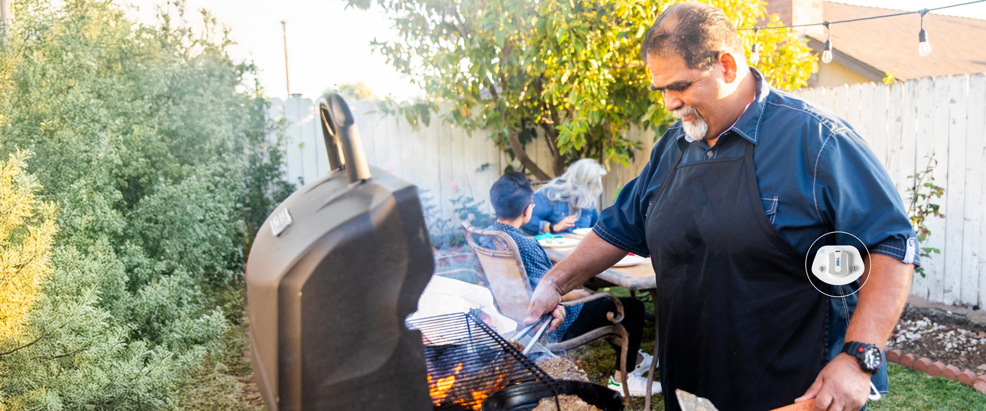 man grilling outside with ZOLL Heart Failure Management System (HFMS) patch overlay