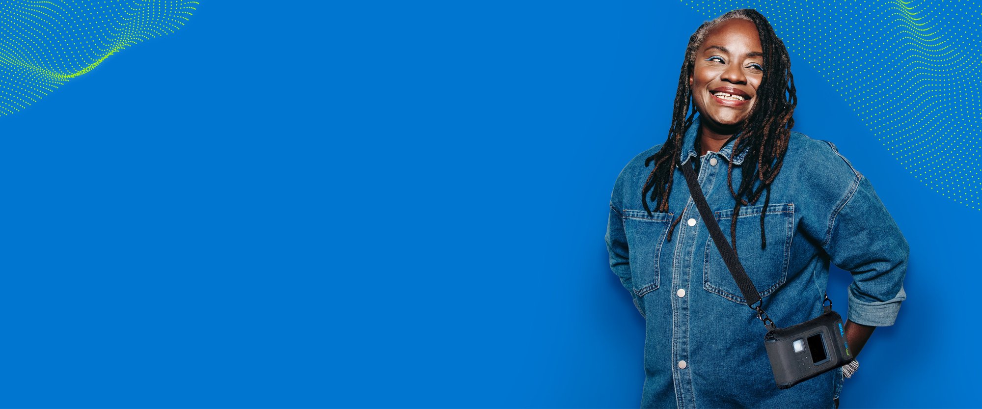 LifeVest Innovation Campaign Woman with Blue Background and Green Dots_2400x1000