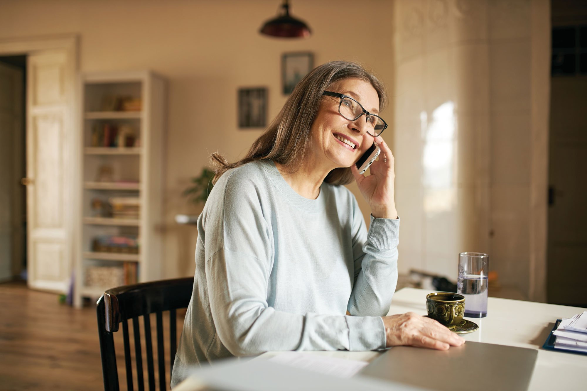 Patient at home on the phone for a support request